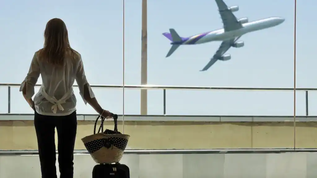 Girl at the airport window