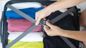 young adult female packing luggage for summer vacation woman tourist