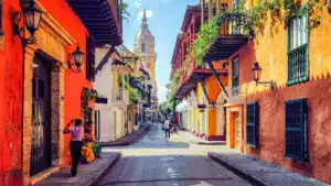 a street in cartagena colombia with a lovely church tower